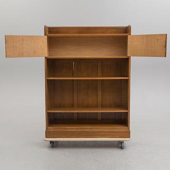 An early 20th century bookcase /  cabinet.