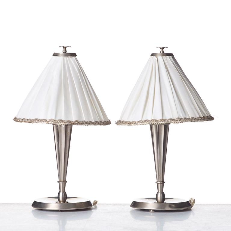 HARALD ELOF NOTINI, a pair of pewter table lamps by Böhlmarks, Stockholm 1920's-30's.