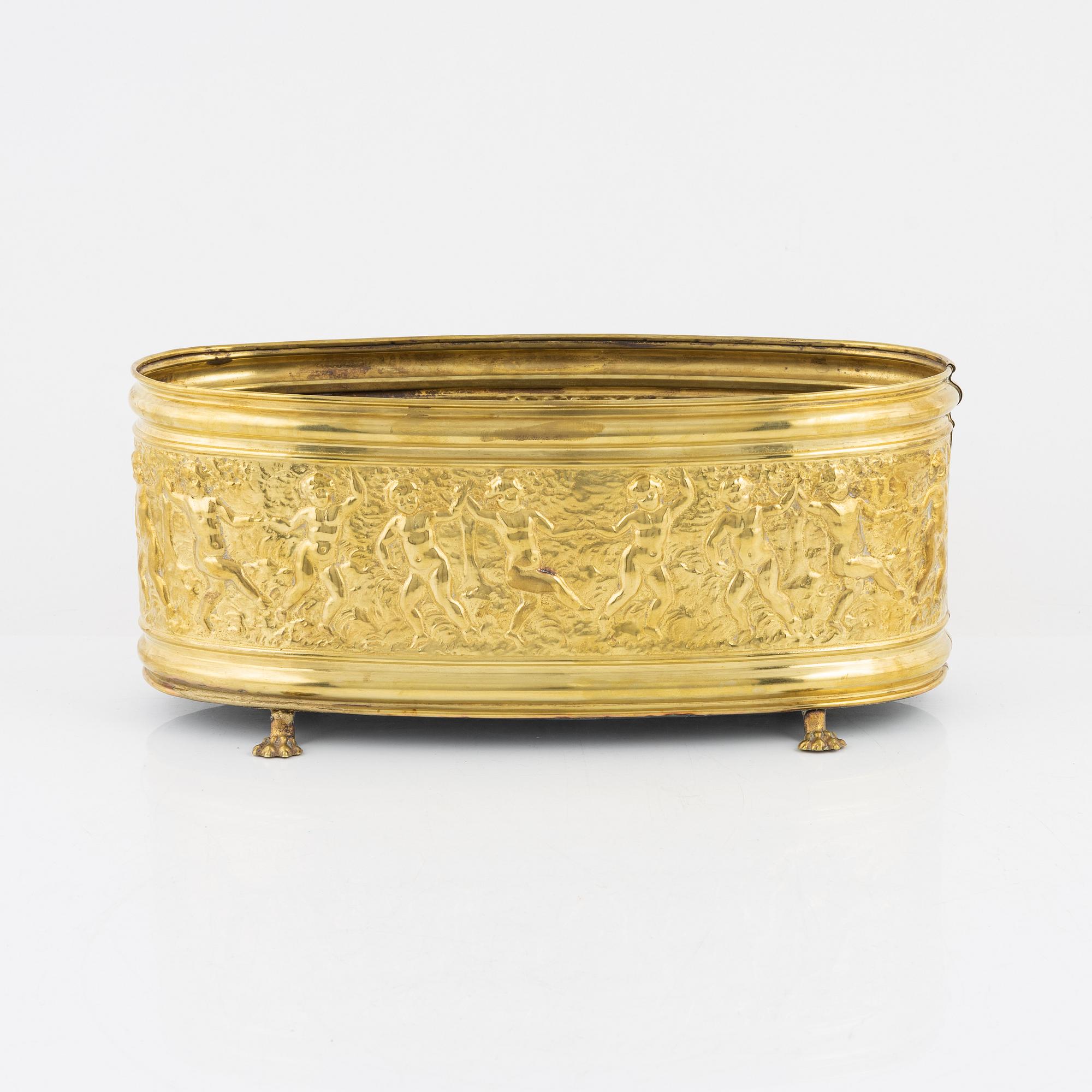 A brass jardiniere, circa 1900.