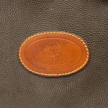 Mulberry, a scotch grain suitcase.