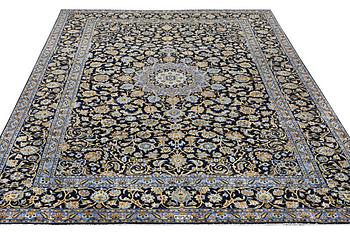 A carpet, Kashan, c. 393 x 297 cm.