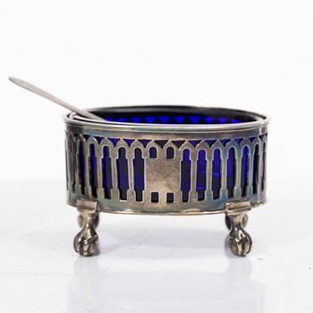 Two silver salt cellars, and a mustard pot, French hallmarks, late 18th Century.