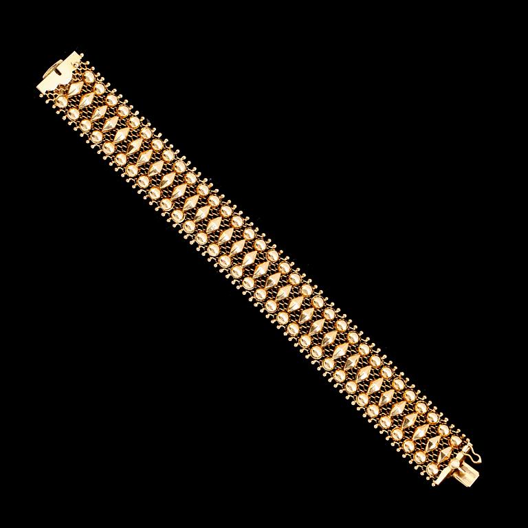 ARMBAND, 18 k guld. Vikt ca 35 g.
