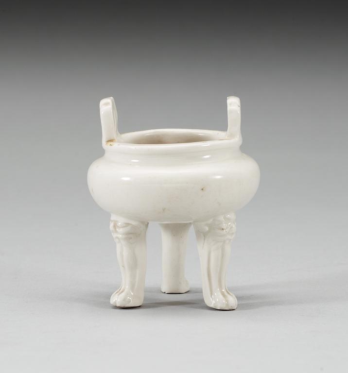 A blanc de chine miniature tripod censer, Qing dynasty, Kangxi (1662-1722).