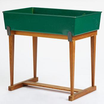 Josef Frank, a rare flower table with green lacquered box model "B 2084", Firma Svenskt Tenn, Sweden, 1950-60s.
