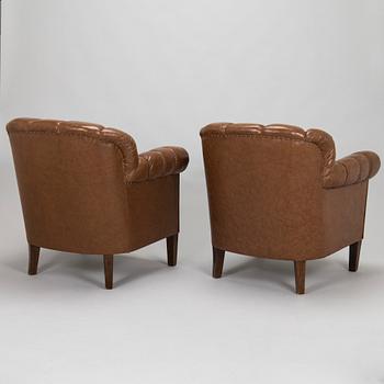 A pair of 1920s armchair.