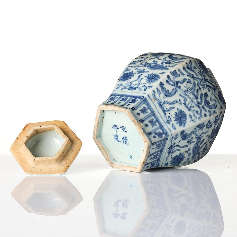 A blue and white faceted 'lotus and birds' jar with cover, Ming dynasty (1368-1644).