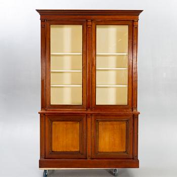 A modern mahogany display cabinet.