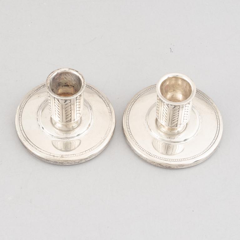 A pair of silver candlesticks, marks of W.A. Bolin, Stockholm, Sweden 1941.