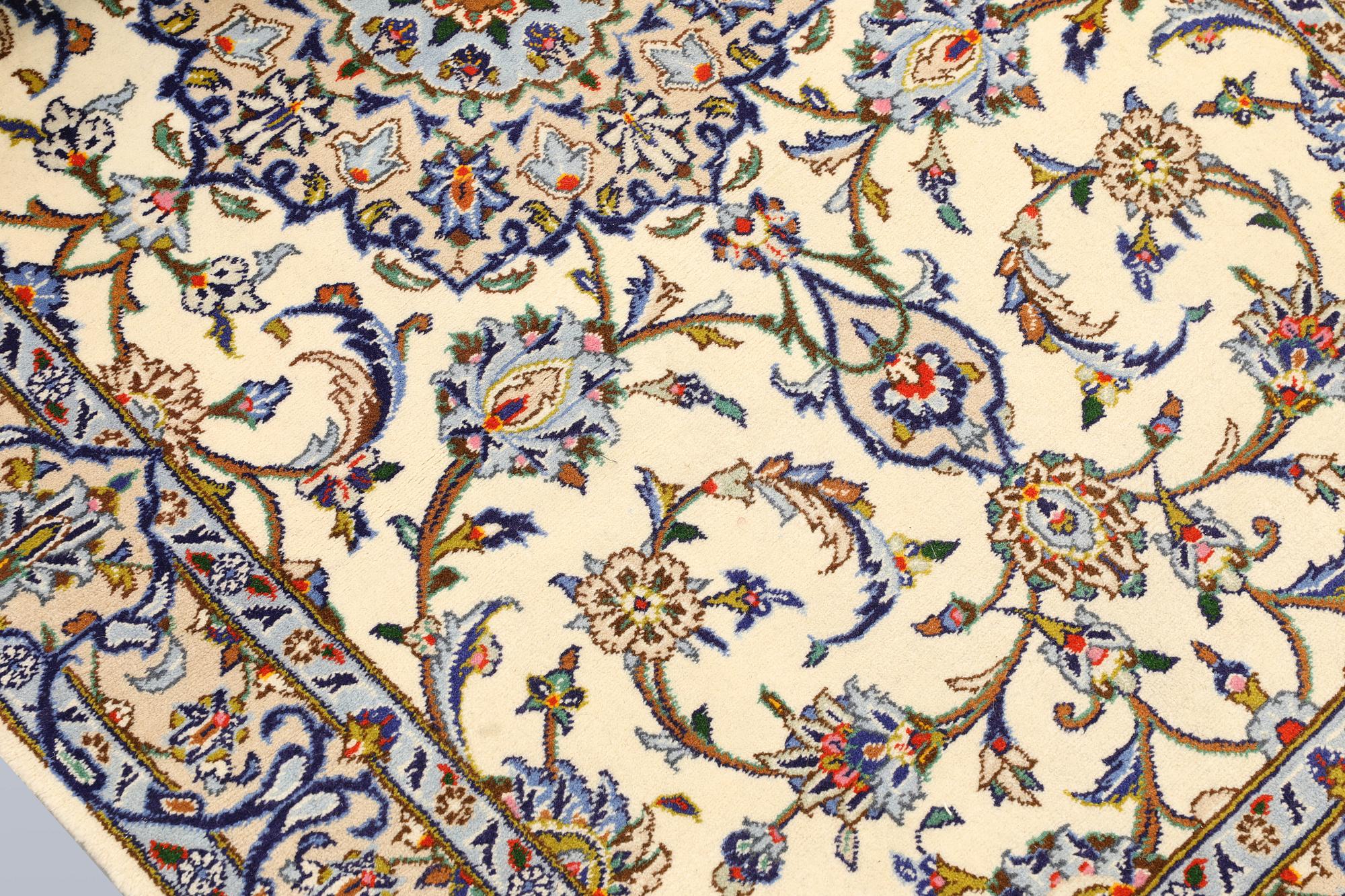 A Keshan runner, c. 586 x 103 cm.