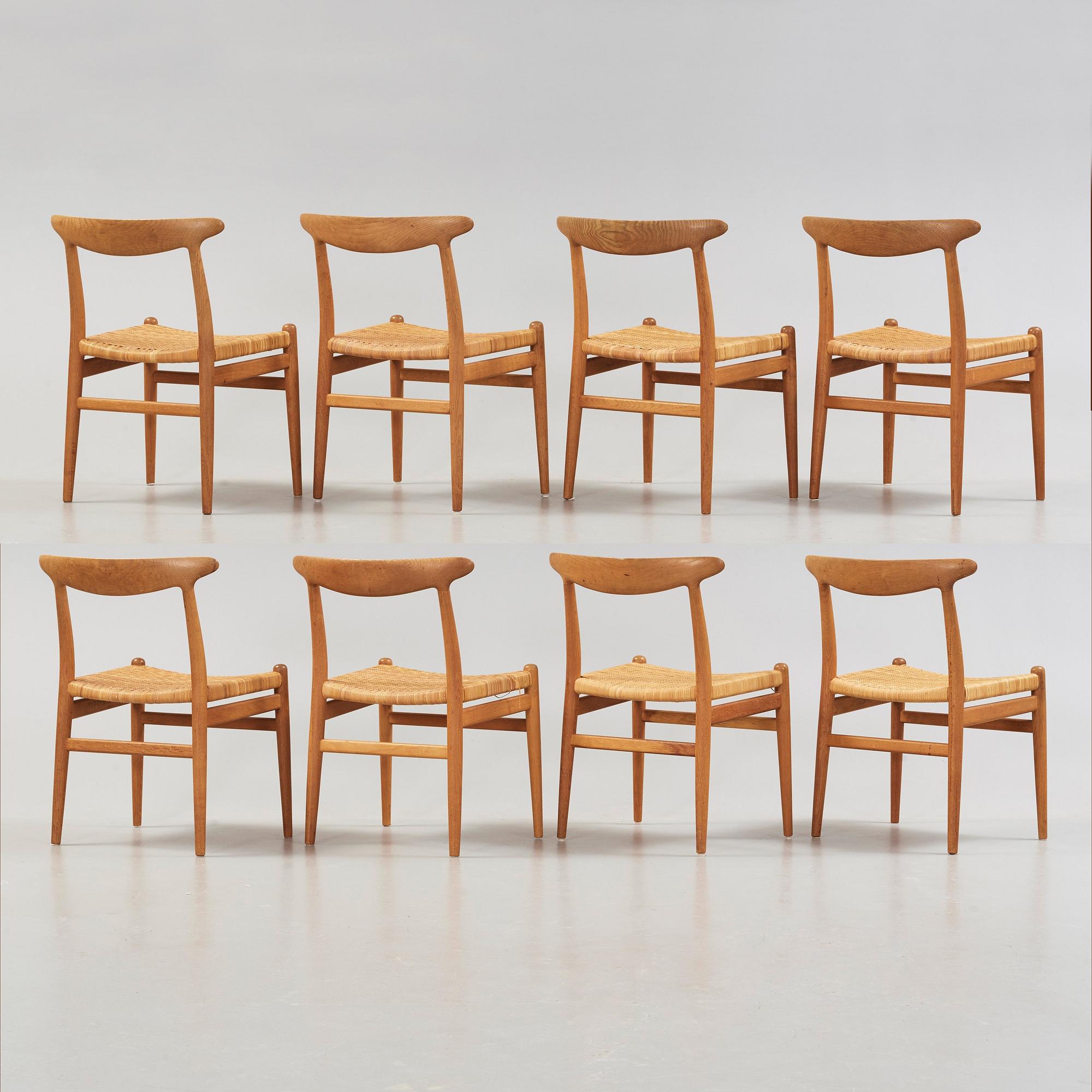 Hans J. Wegner, A set of eight oak chairs by Carl Madsen, Denmark 1950-60's.