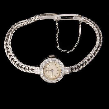 DAMARMBANDSUR, vitguld 18K, med 22 diamanter. Baume & Mercier, Geneve. Svensk importstämpel. Tot ca 21 gram.