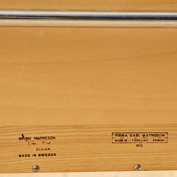Bruno Mathsson, a lounge chair with wheels, Firma Karl Mathsson, Värnamo, 1940s, with reading table from 1972.