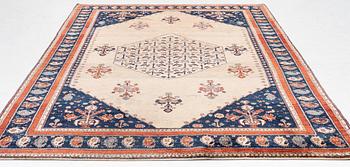 An oriental carpet, c. 325 x 210 cm.