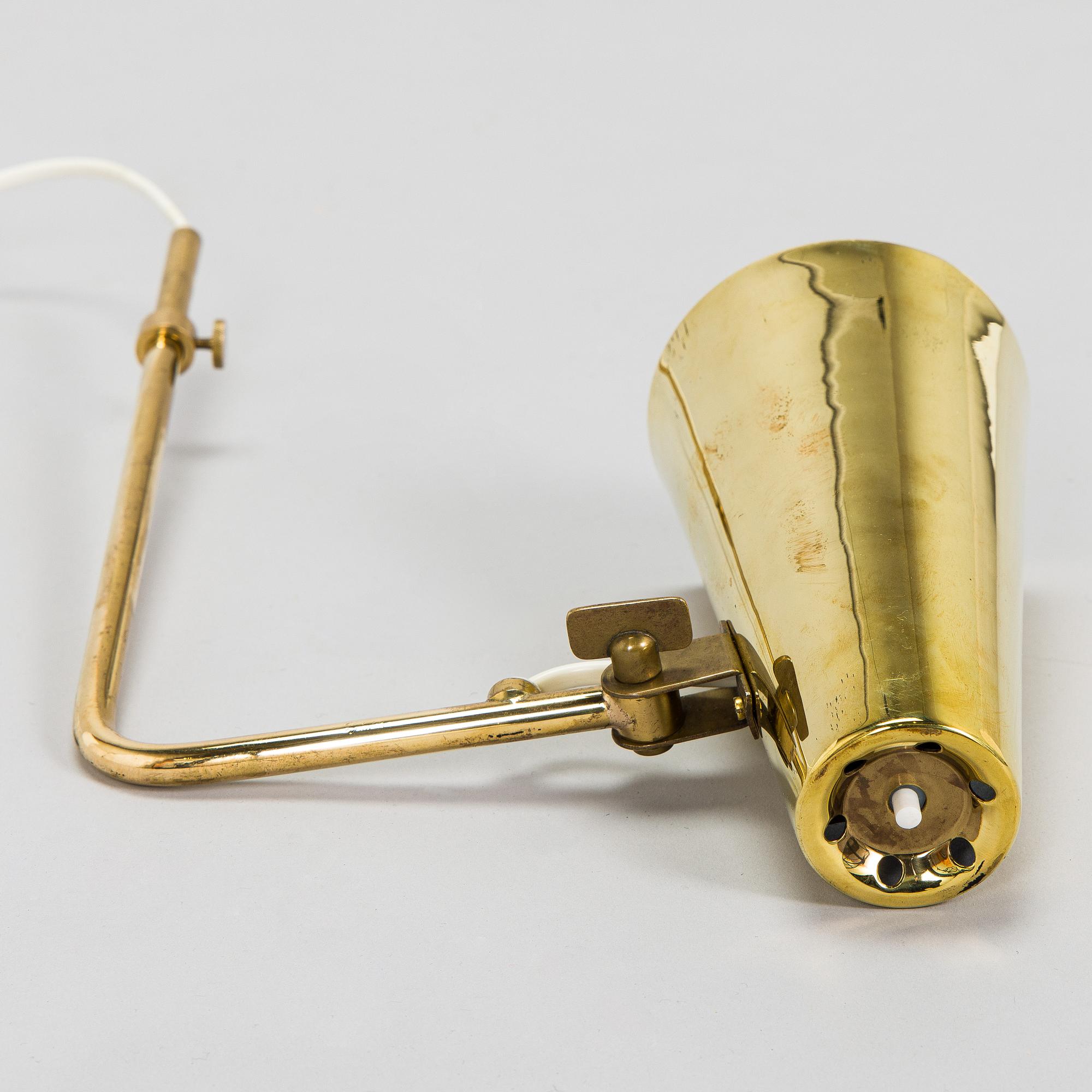 Paavo Tynell, a brass wall light model 9459, Idman, Finland 1960s.