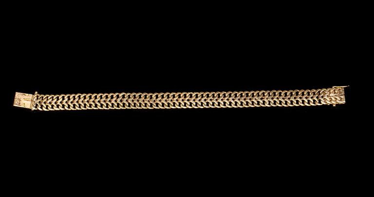 ARMLÄNK, 18K guld. M K:s Guldsmedsateljé, Stockholm 1961. Vikt ca 28 gram.