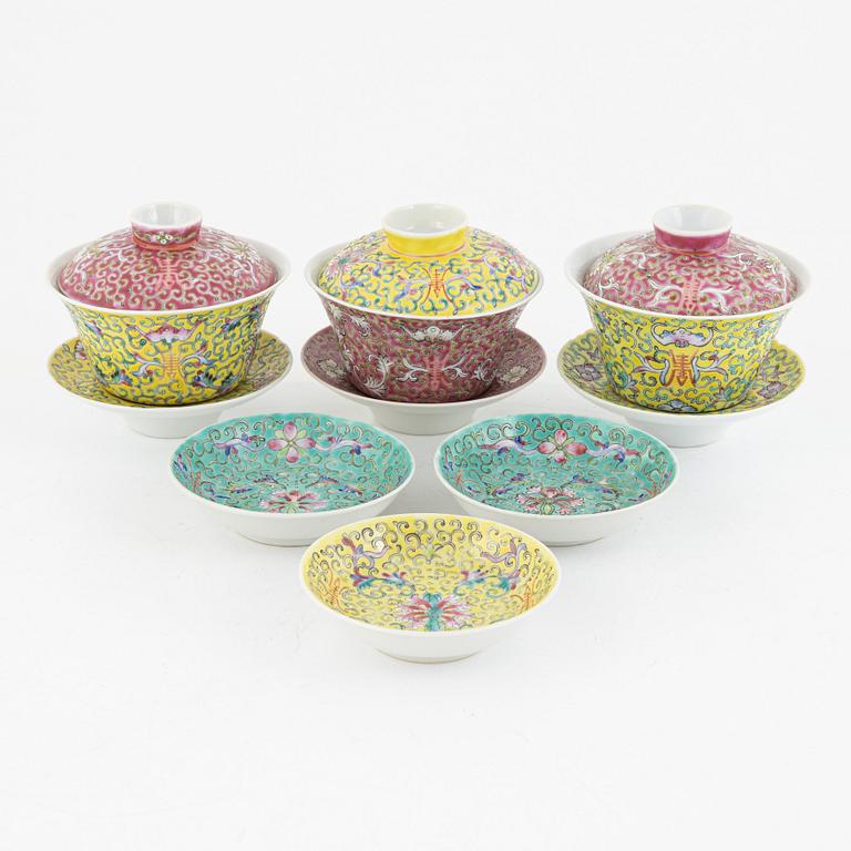 A group of three Chinese enamelled porcelain cups with covers and stands, three small dishes, 20th century.