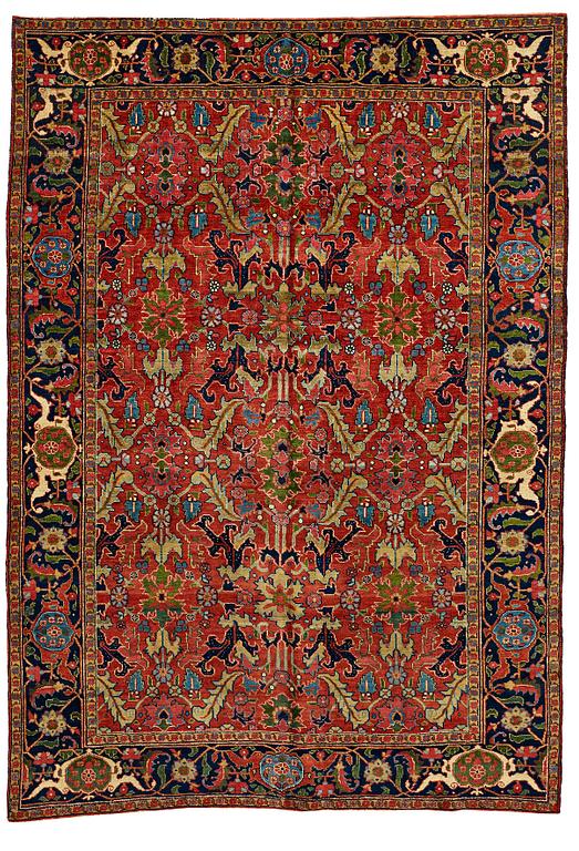 A CARPET, a semi-antique Heriz, ca 322-327 x 226,5 cm.