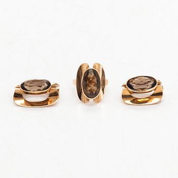 Eero Rislakki, ring, hänge och brosch, 14K guld, rökkvarts. Westerback, Helsingfors, 1959-61.