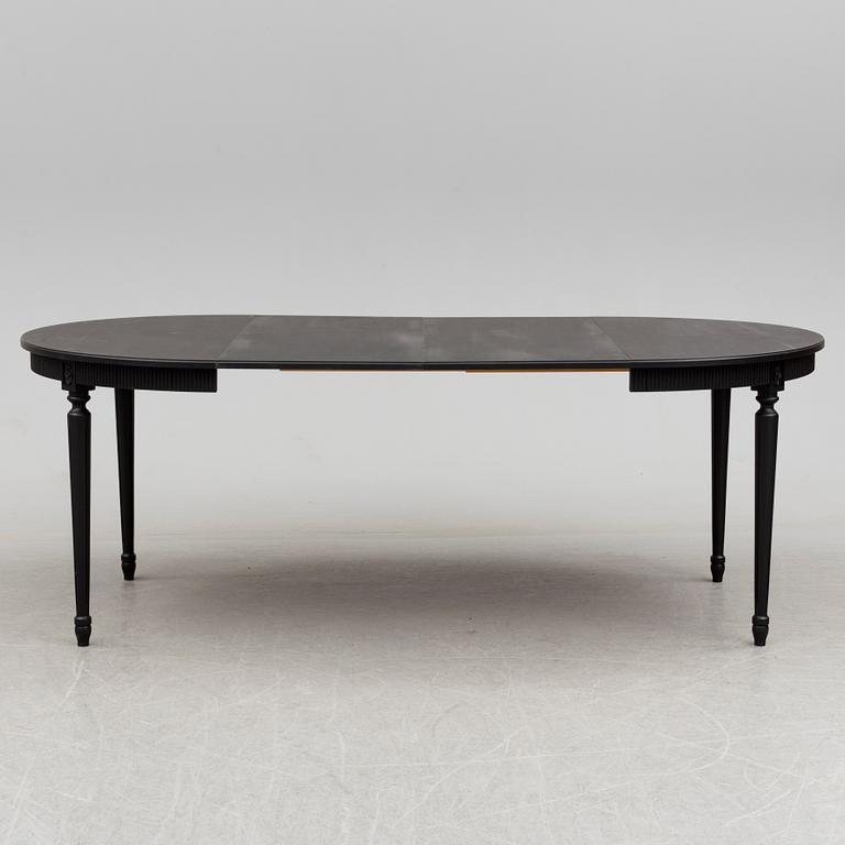 A second half of the 20th century Gustavian style dining table.