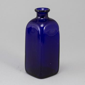 A 19th century blue glass bottle.