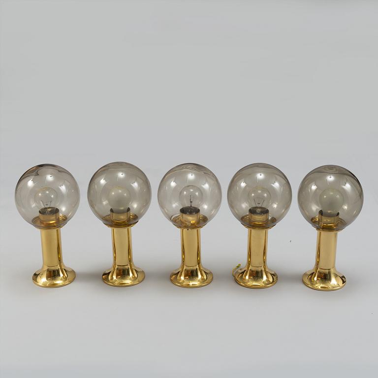 Five 1970's brass and glass ceiling/table lamps, Ott international.