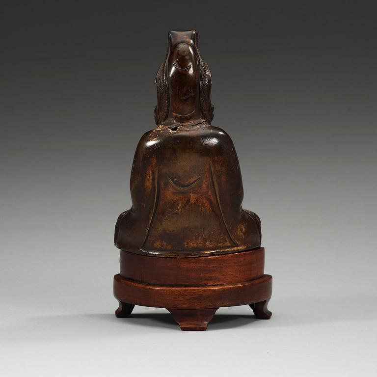 A seated figure of Guanyin, late Ming-/early Qing dynasty.