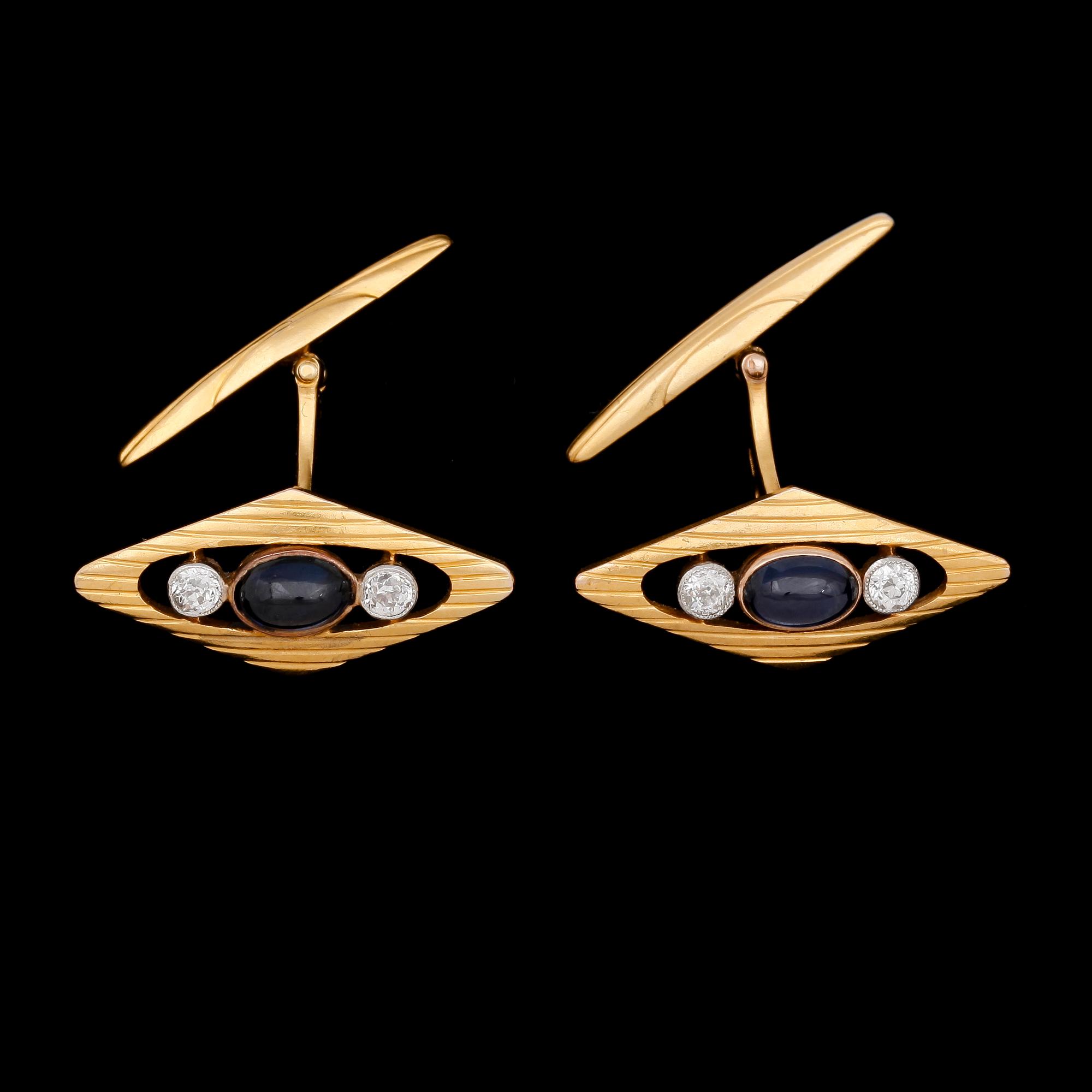 CUFFLINKS, one pair, cabochon cut blue sapphires and antique cut diamonds, tot. 0.25 cts. Russia.