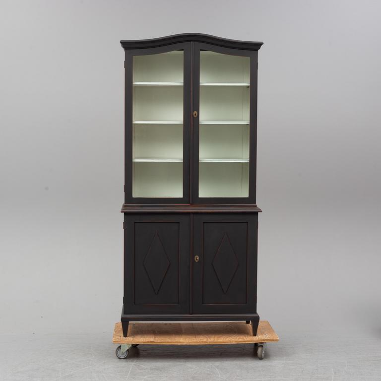 An early 20th century painted display cabinet.