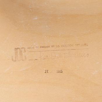 Four chairs by Karl-Erik Ekselius.