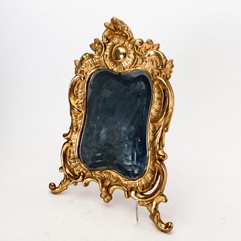 A mid 18th century gilded rococo mirror.