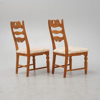 Henning Kjærnulf, a set of six oak 'Razorblade' chairs with new sheepskin upholstery, EGK, Denmark 1960s.