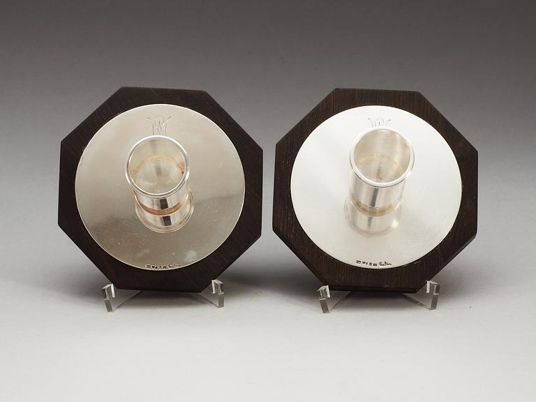 A pair of Wiwen Nilsson sterling and ebony candle sticks, Lund 1937.