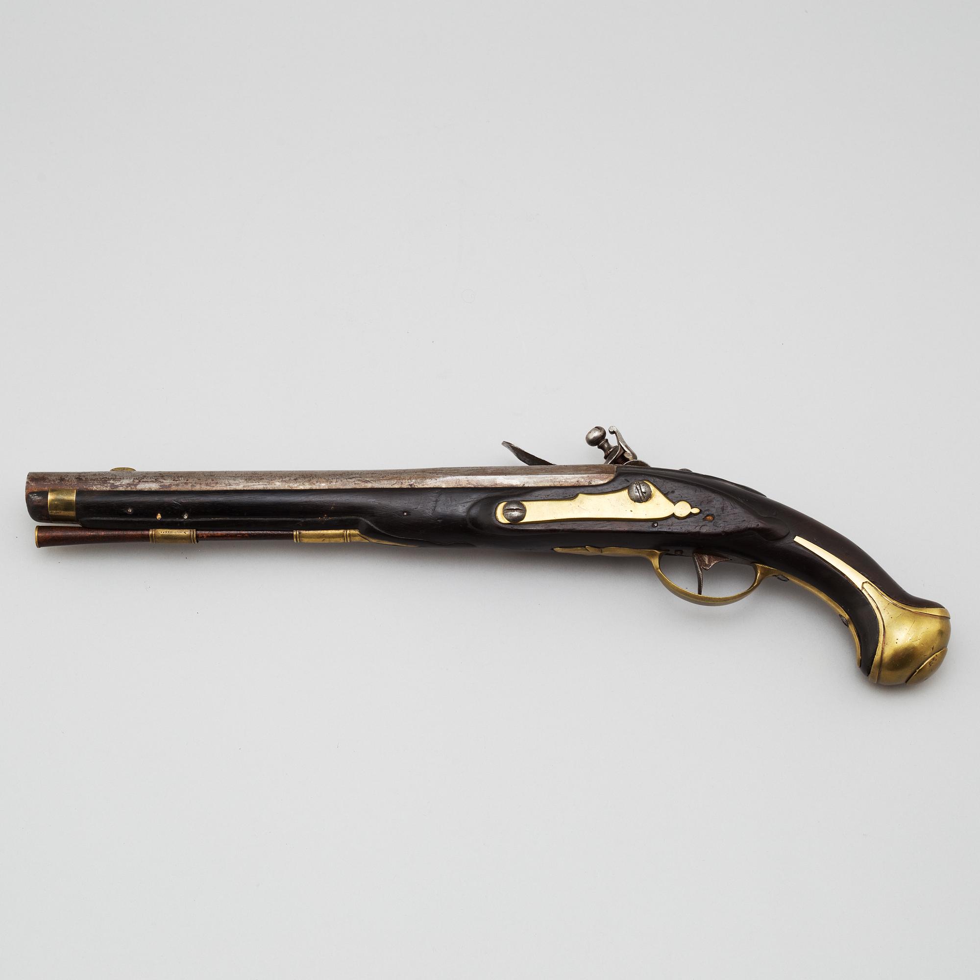 A 18th century flintlock pistol.