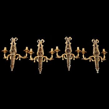 Four Louis XVI-style late 19th century two-light wall-ligts by Victor Paillard (1805-1886).