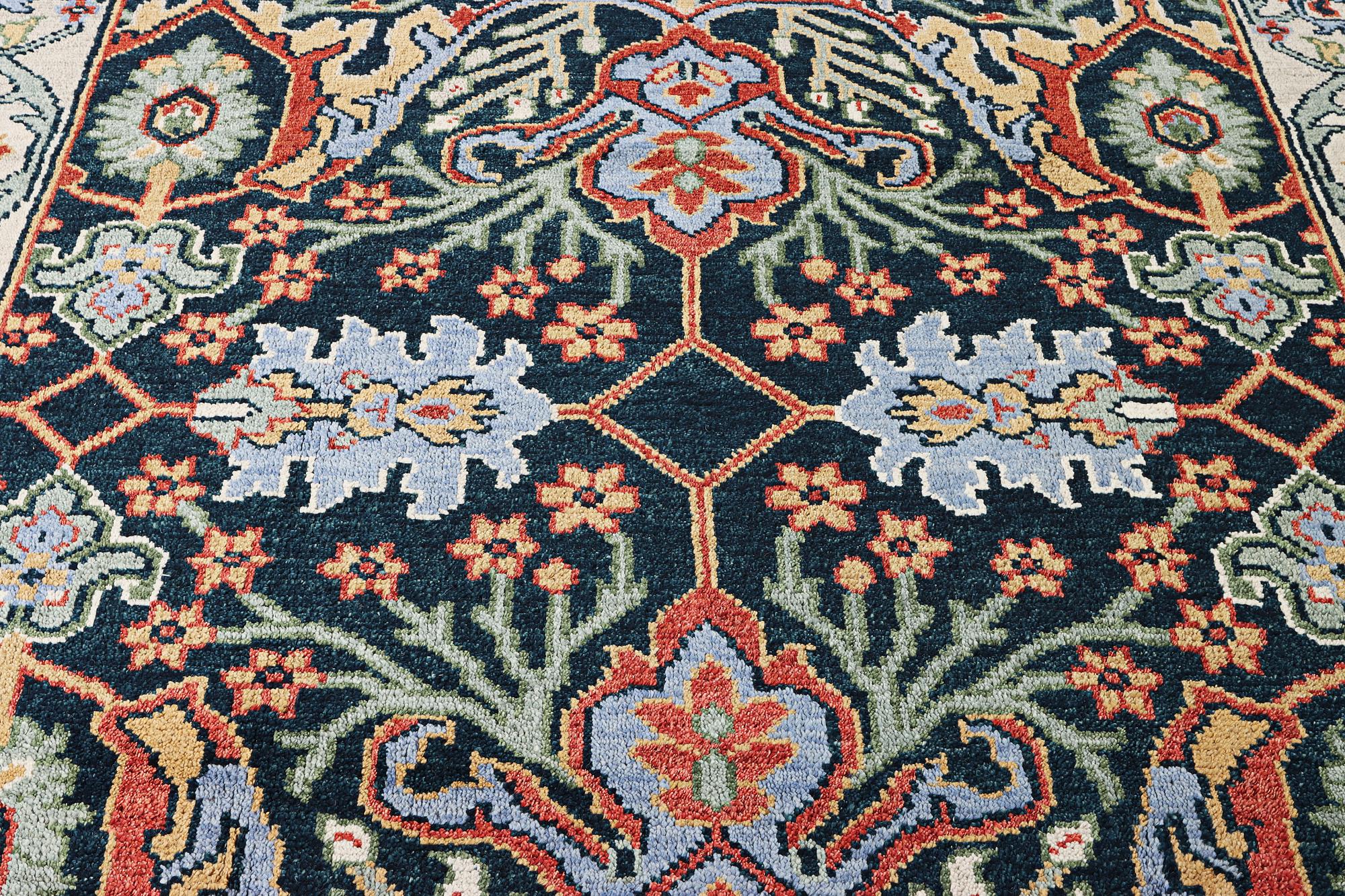 An oriental carpet with Mamluk design, c. 308 x 250 cm.