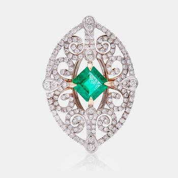 An octagonal/step-cut emerald, 1.65 cts, and diamond 1.25 cts (pavé-set) ring.