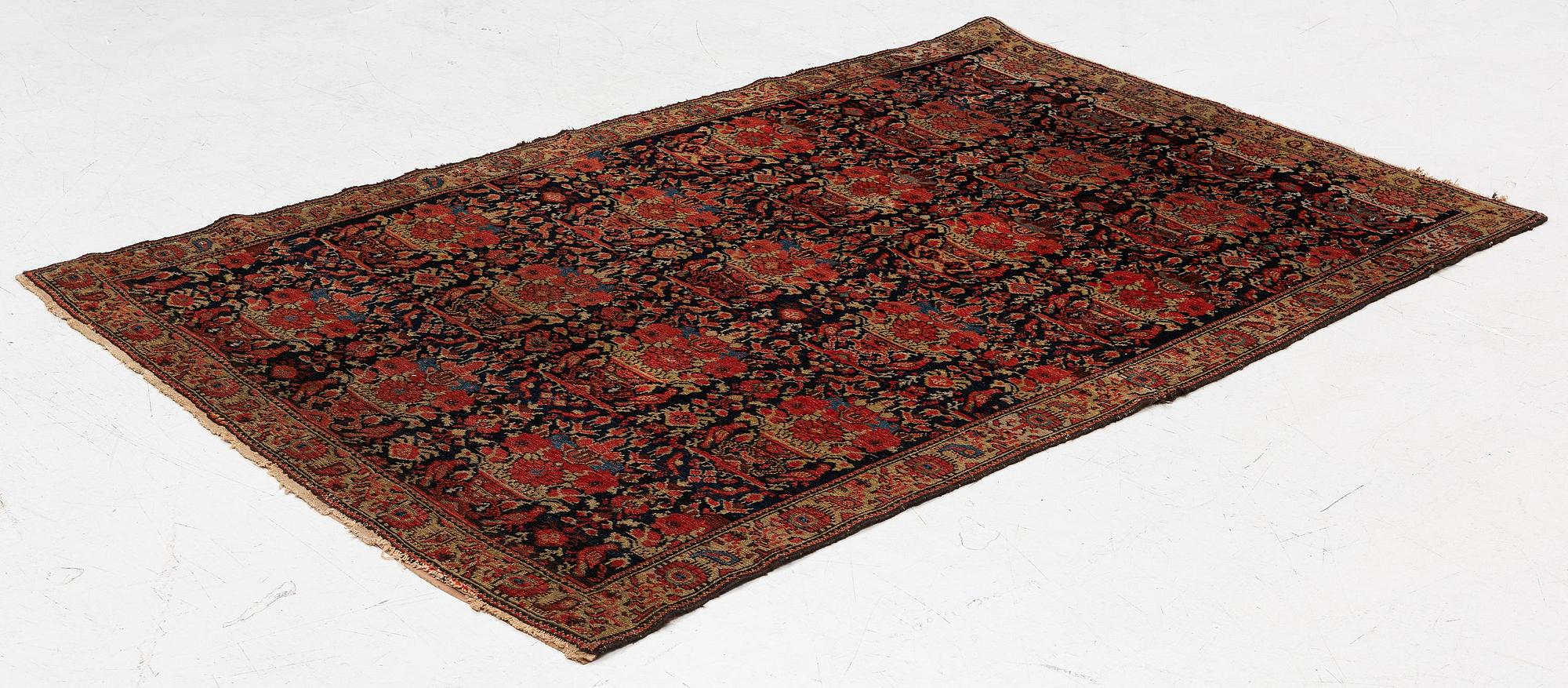 A Senneh carpet, West Persia, c. 187 x 125 cm.