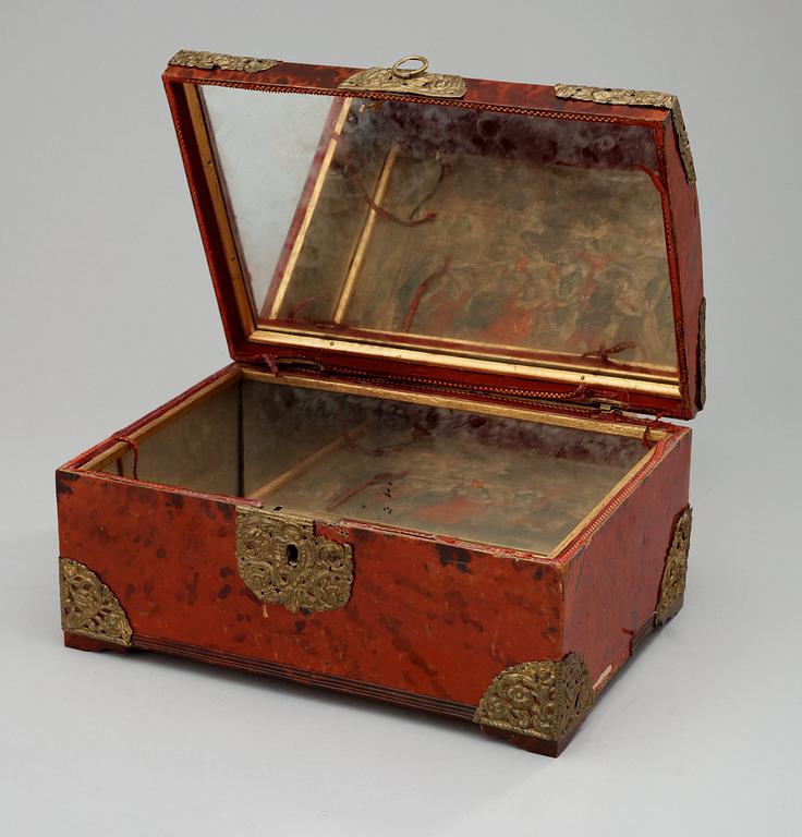 A Baroque 18th century tortoiseshell veneered casket.