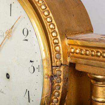 A late gustavian ca 1800 wall clock by Jacob Kock (clockmaker in Stockholm 1762-1803).