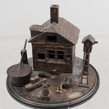 A late 19th century carved smoking table.