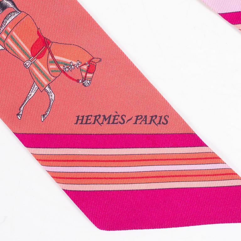 Hermès, a 'Twilly' scarf.