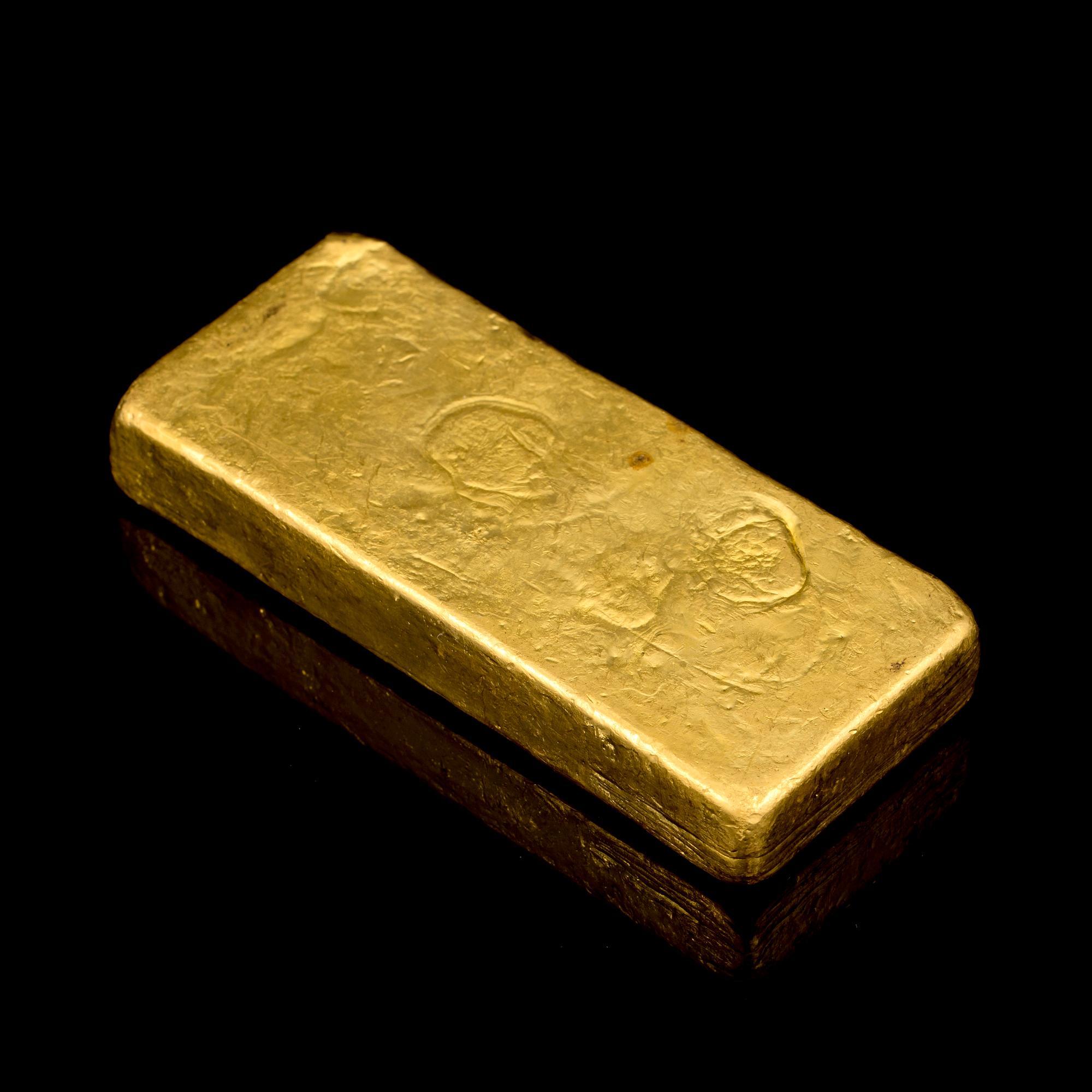A 23K gold ingot, 1003 g, Ugdo essayeur fondeur.