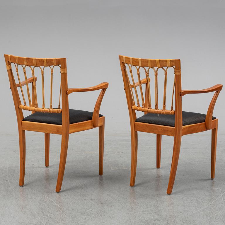 A pair of mahogany and rattan dining armchairs, Josef Frank, , model 1165, Svenskt Tenn, Stockholm.