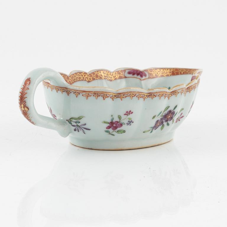 A famille rose dish, sauce boat and bowl, Qing dynasty, 18th Century.