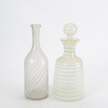 A set f two Italian mid 1900s glass decanters.