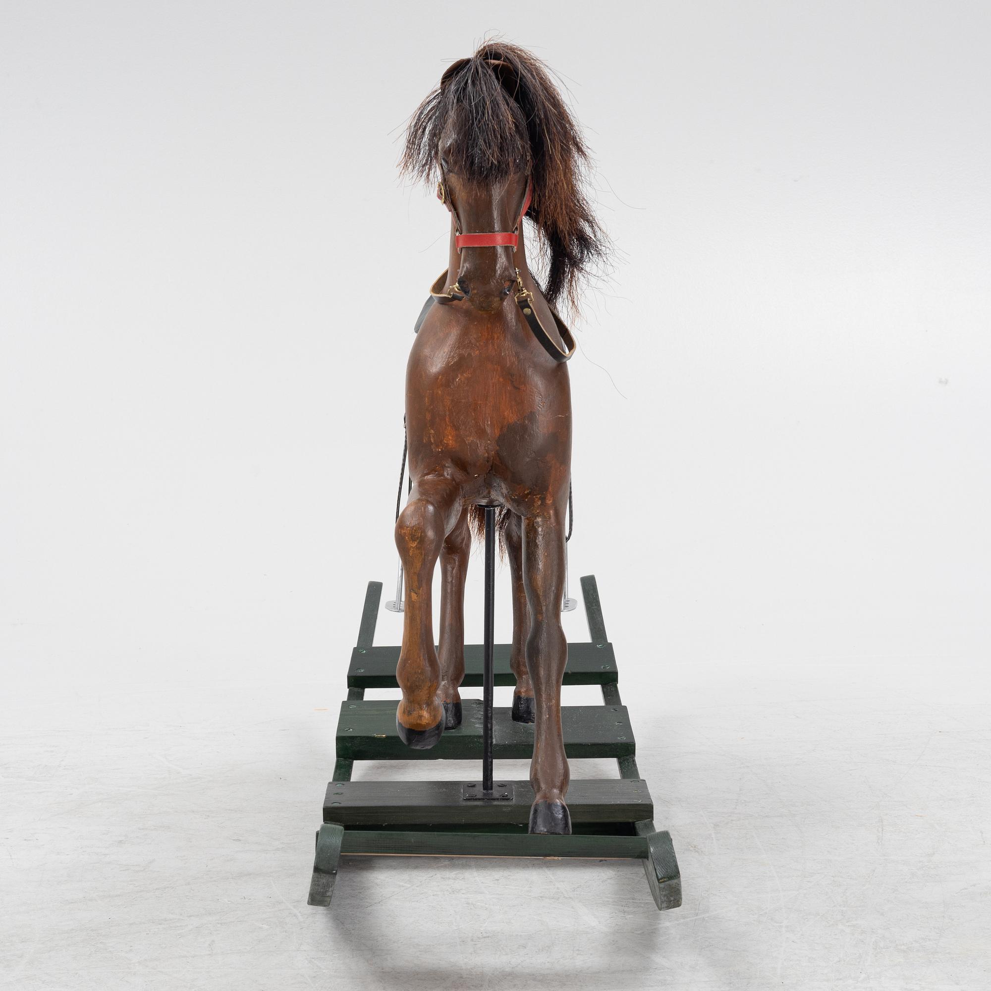 An early 20th century rocking horse.