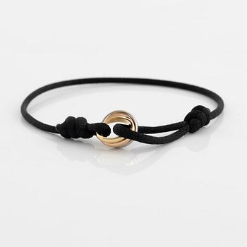 A Cartier "Trinity" bracelet, 18K three colour gold and textile.