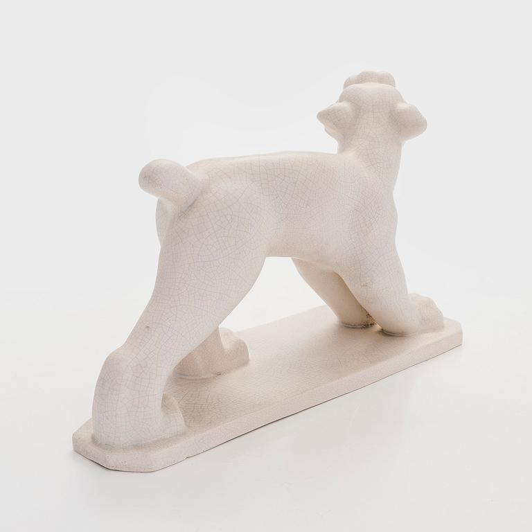 Josef Manuel, A ceramic sculpture, signed.