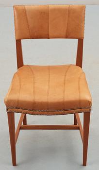 A Josef Frank mahogany and leather chair, model 695, upholstered by Jonny Johansson, Acne for Svenskt Tenn 2009.
